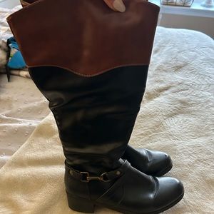 Black and brown tall riding boots